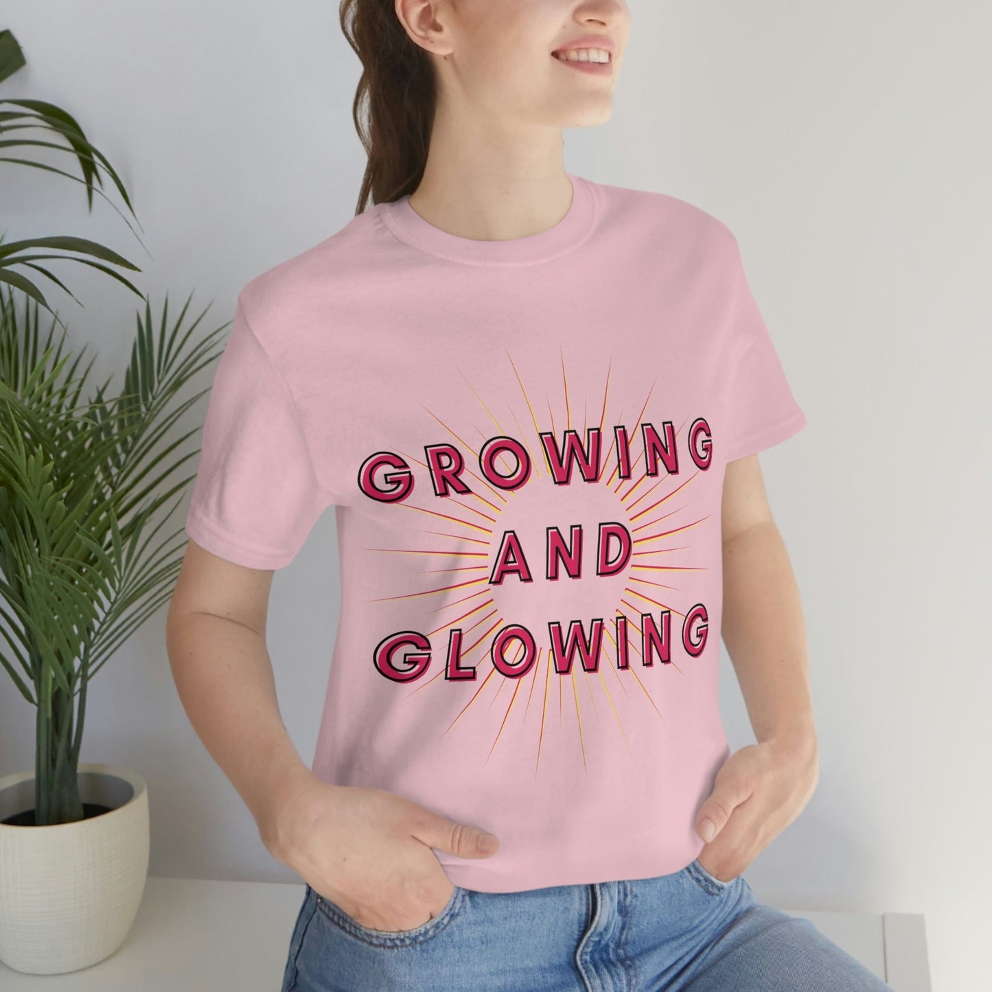Growing And Glowing ( Graphic Pink And White Text Sun Burst ) Unisex Jersey Short Sleeve Tee - Style: Bella+Canvas 3001
