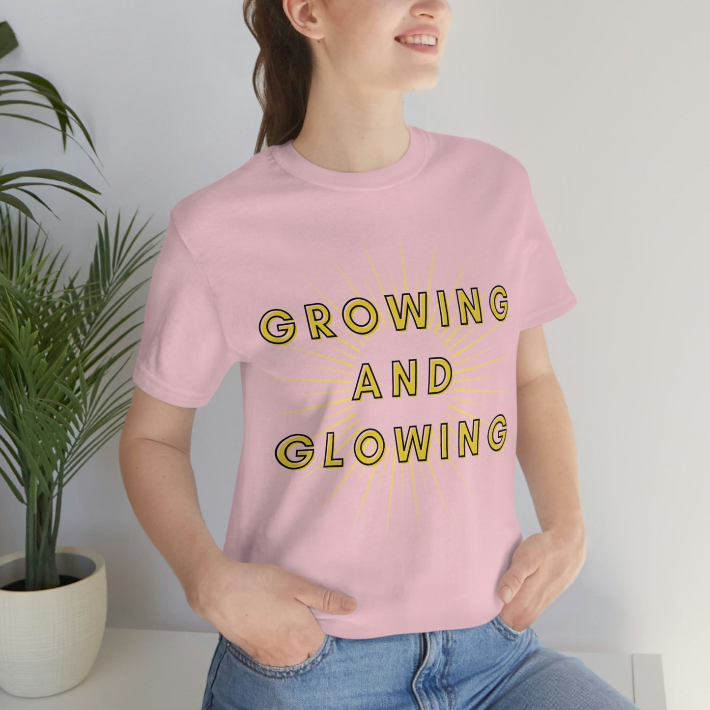 Growing And Glowing  ( Graphic Yellow and Black Text Sun Burst ) Unisex Jersey Short Sleeve Tee - Style: Bella+Canvas 3001