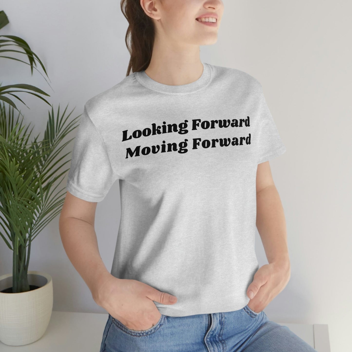 Looking Forward, Moving  Forward (Graphic Black Text) Unisex Jersey Short Sleeve Tee - Style: Bella+Canvas 3001