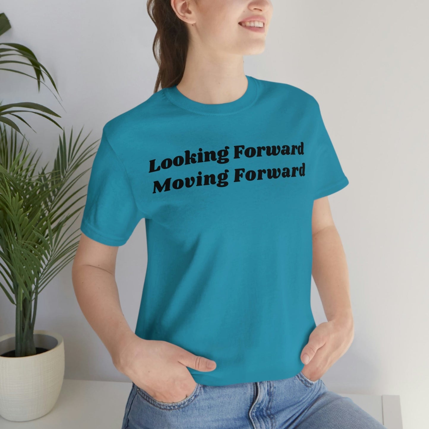 Looking Forward, Moving  Forward (Graphic Black Text) Unisex Jersey Short Sleeve Tee - Style: Bella+Canvas 3001